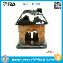 Brûleur à huile en céramique de forme de maison de pot